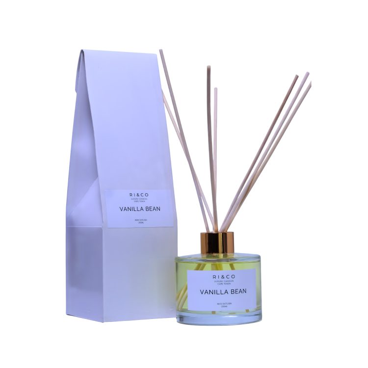 vanilla bean luxury reed diffuser in glass bottle with rattan reeds, warm creamy vanilla fragrance.