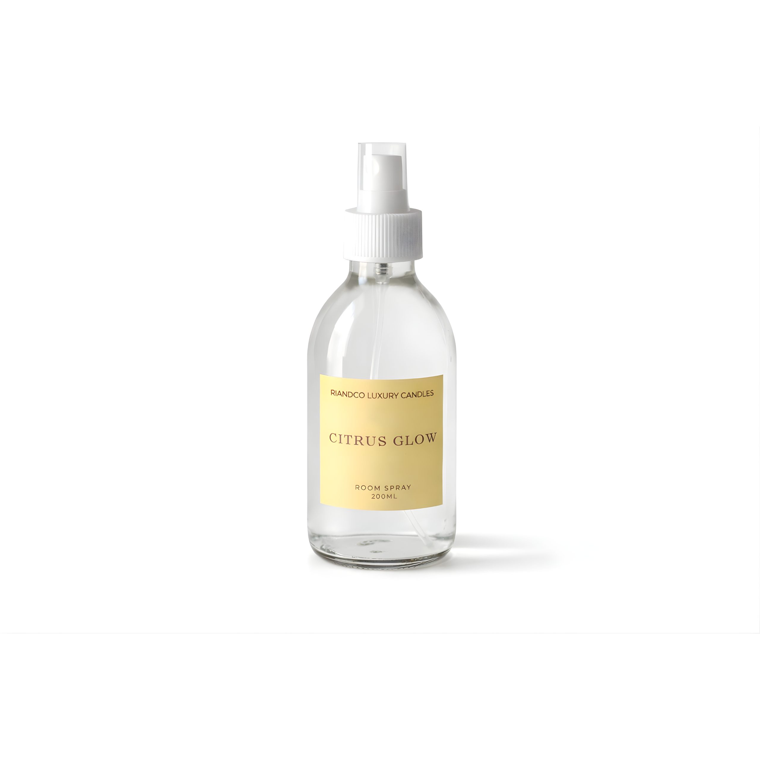 Riandco Luxury Candles Citrus Glow room spray in clear glass bottle on white background