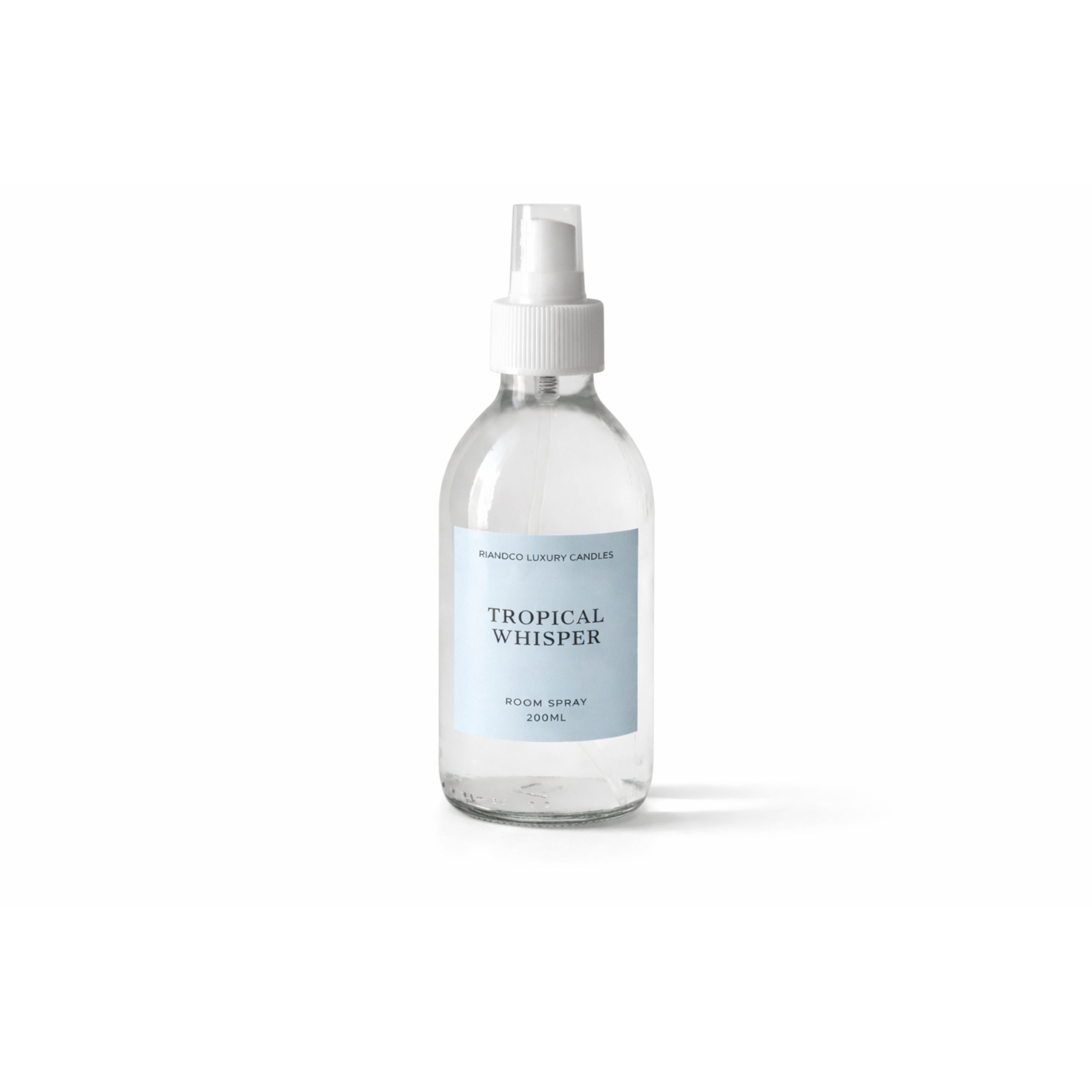 Riandco Luxury Candles Tropical Whisper room spray in clear glass bottle on white background